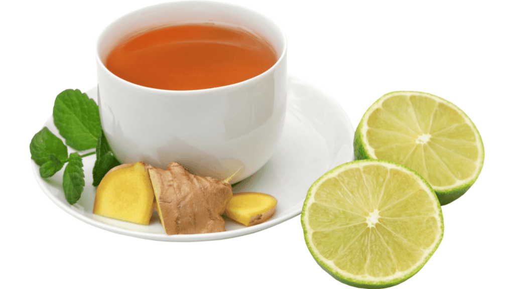 A cup of ginger and lemon tea, with fresh lemon slices and ginger root, offering a soothing and immune-boosting drink.